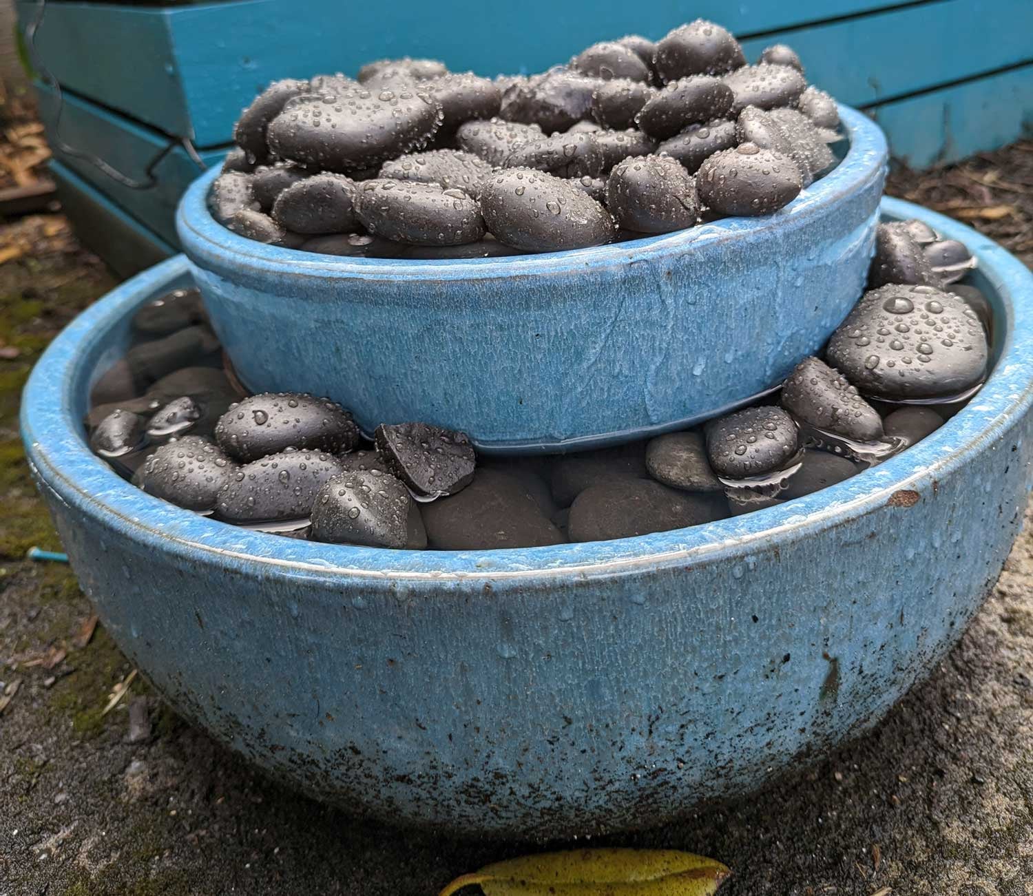 A blue ceramic spillover fountain built from scratch and a $US15 ($21) pump.  (Photo: Amanda Blum)